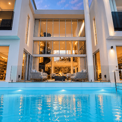 Courtyard pool in front of the glass facade